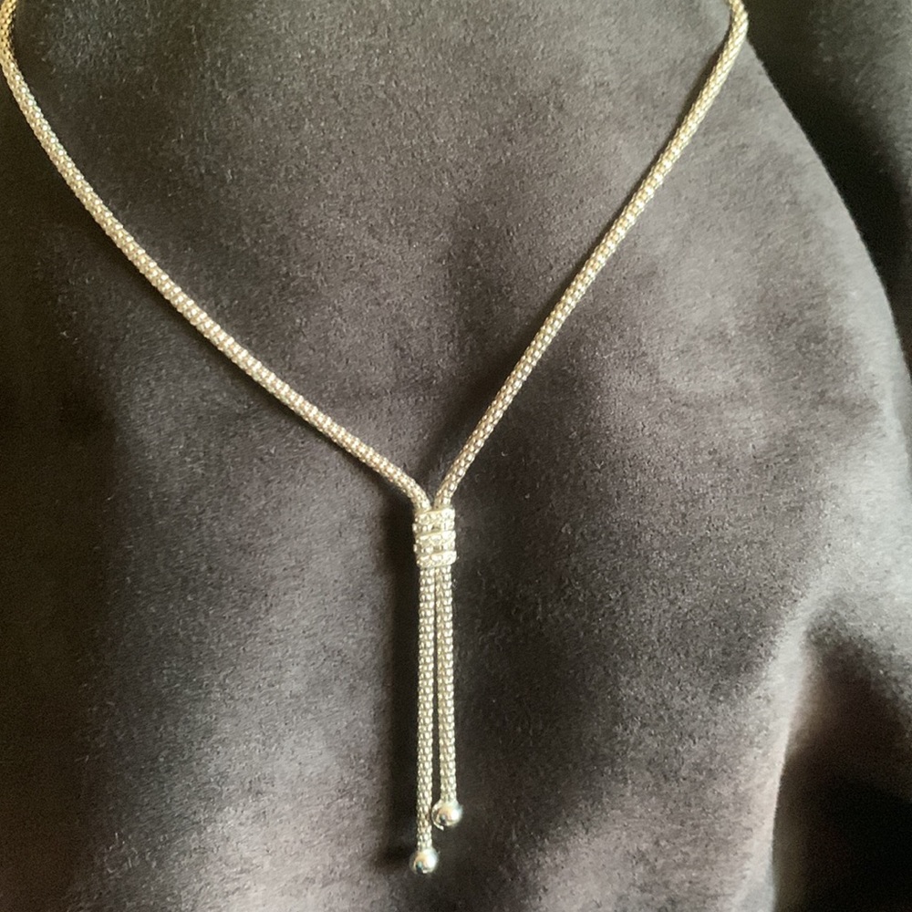Adjustable 16” 925 Sterling necklace with diamond accents. Stunning